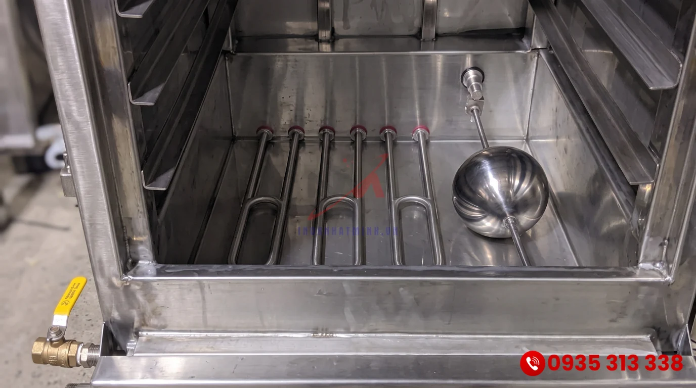 Chi tiết thanh điện trở gia nhiệt và hệ thống phao cấp nước bên trong tủ nấu cơm